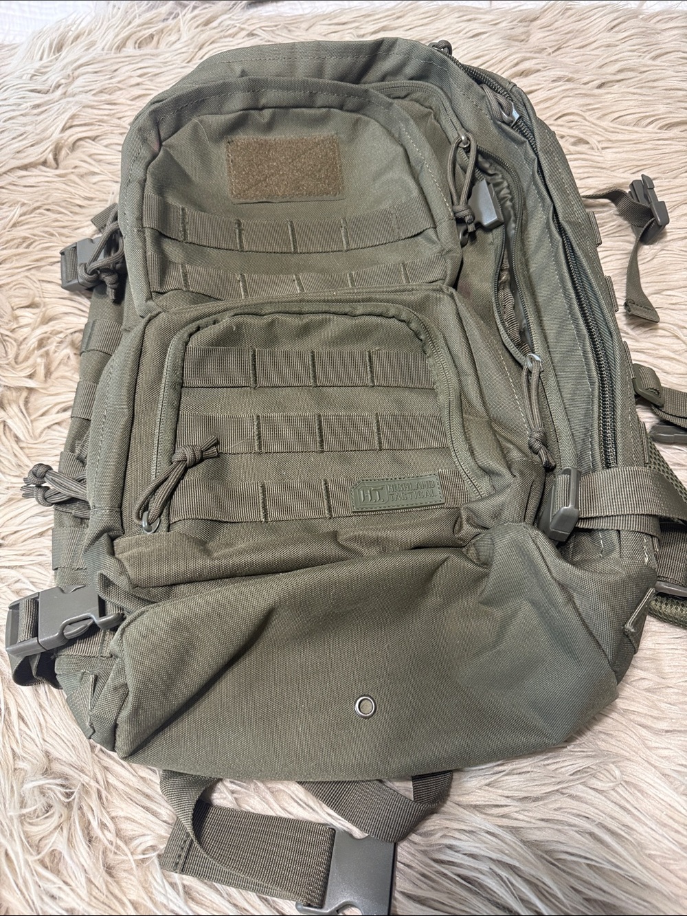 Tactical Military-Style Olive Green Backpack with MOLLE Panels